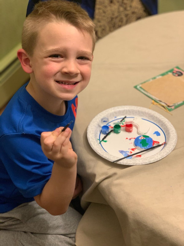 Parker is enjoying painting!
